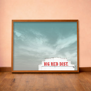Big Red Building Big Sky Waco art print by Betsy Crum — horizontal room scene