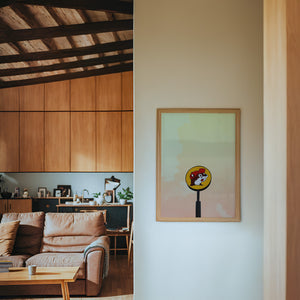 Buc-ee's Under a Big Sky Texas art print by Betsy Crum — framed in a wood-accent room