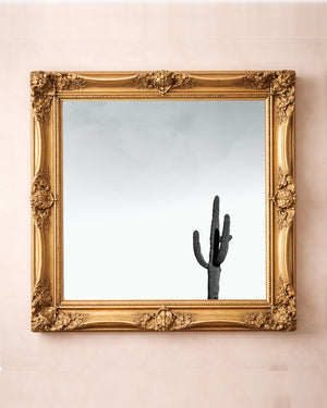 Cosmic saguaro cactus art print by Betsy Crum in a square gold frame, black and white desert art