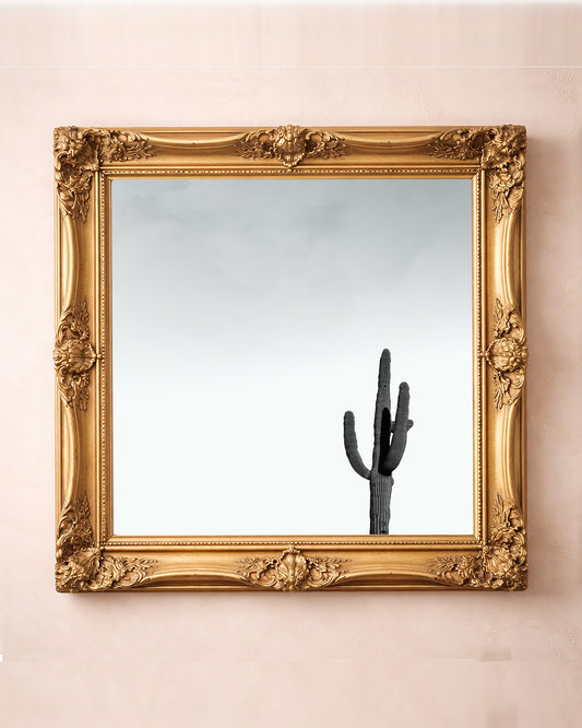 Cosmic saguaro cactus art print by Betsy Crum in a square gold frame, black and white desert art