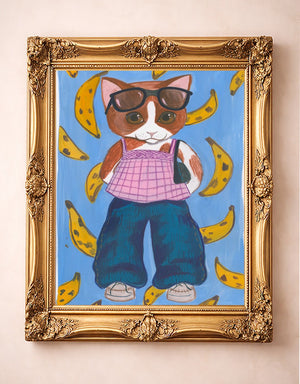 Banana Kitty — art print by Caya Crum in a gold frame