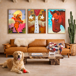 Cowboy Carl Rides Into the Sunset Art Print included in a western style living room wall above a leather sofa displayed with other western art prints.