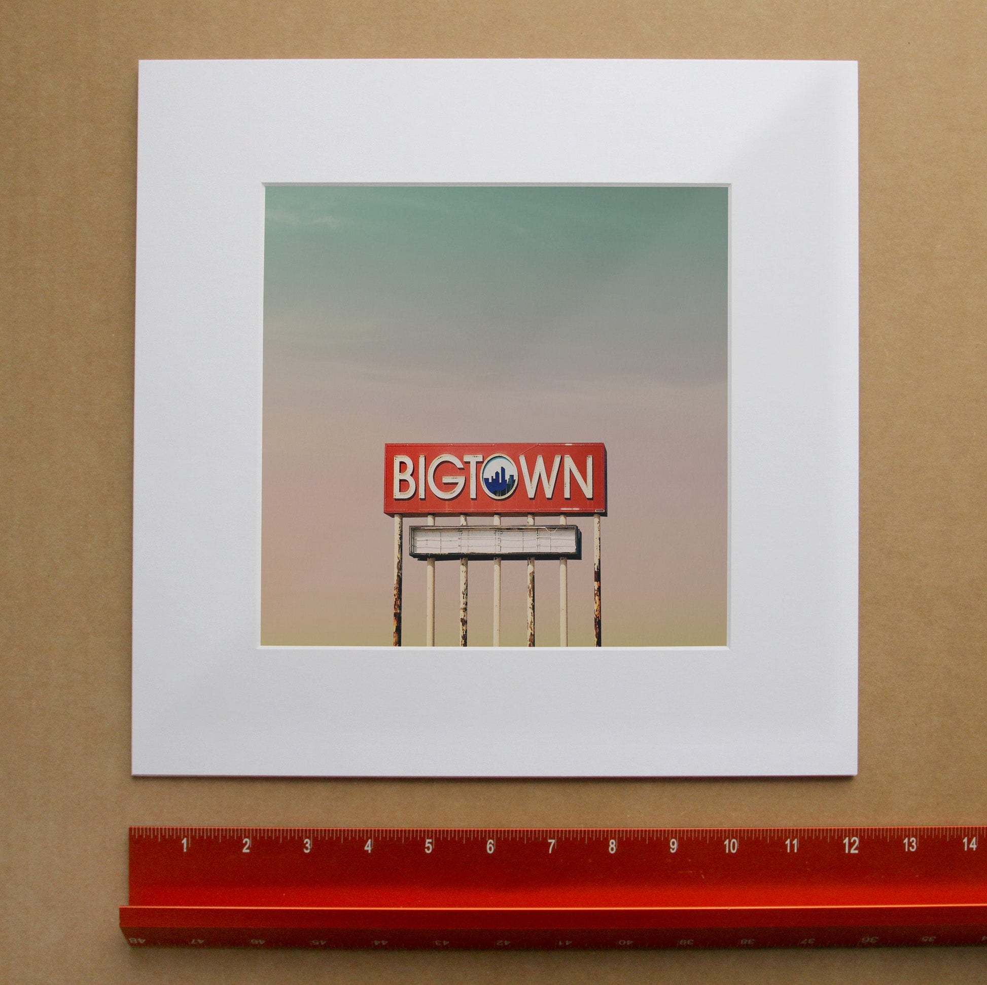 Dallas Art Prints & Gifts – Big Town Sign with Big Dallas Sky | Betsy Crum in matted square frame mockup