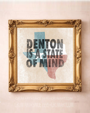Denton State of Mind art print in a gold frame — bold letterpress type over a weathered Texas flag by Betsy Crum. Square Denton wall art, printed in Texas, at crumart.com.