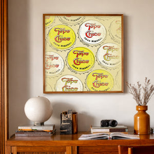 Topo Chico bottle caps print by Betsy Crum in a midcentury room
