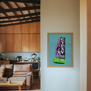 Gypsy Tea Room Dallas art print by Betsy Crum — framed in a wood-accent room
