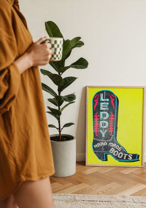 Leddy Boot Yellow cowboy boot art print by Betsy Crum — framed with velvet mat