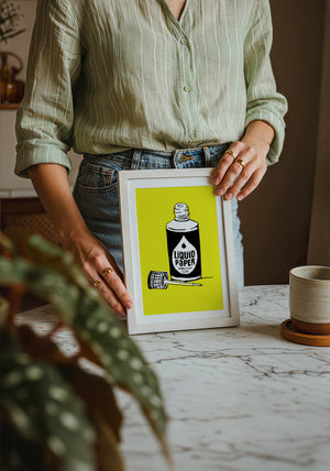 Liquid Paper office wall art print by Betsy Crum — neutral frame room mockup