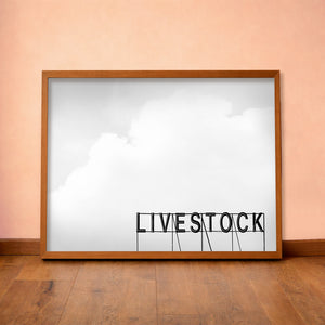 Livestock Sign western art print by Betsy Crum — horizontal room scene