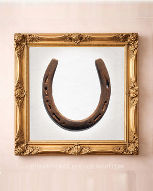 Lucky Horseshoe on White — square horseshoe print by Carl Crum in a gold frame