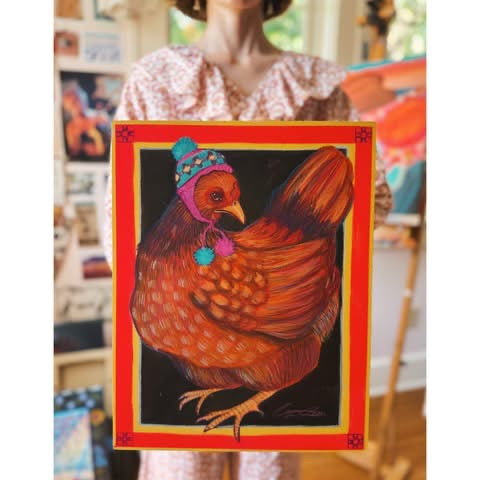 Little Red Hen — the painting in a red patterned frame on the wall