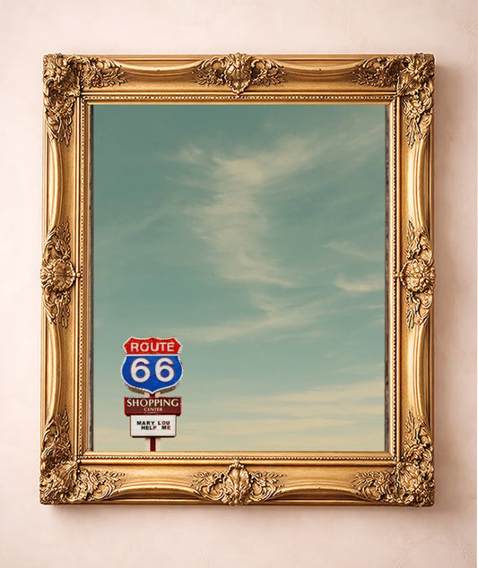 Route 66 Sign Under a Big Sky — art print by Betsy Crum in a gold frame