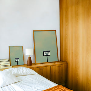 Saxon Pub Austin print by Betsy Crum — framed in a wood-accent room