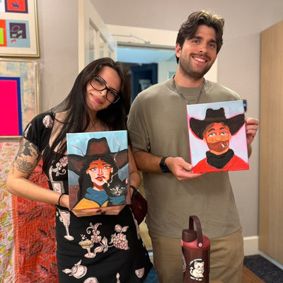Smoking Cowgirl Portrait Workshop — a couple showing their finished cowgirl and cowboy portraits