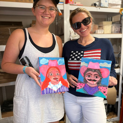 Smoking Cowgirl Portrait Workshop — two friends with their finished cowgirl paintings