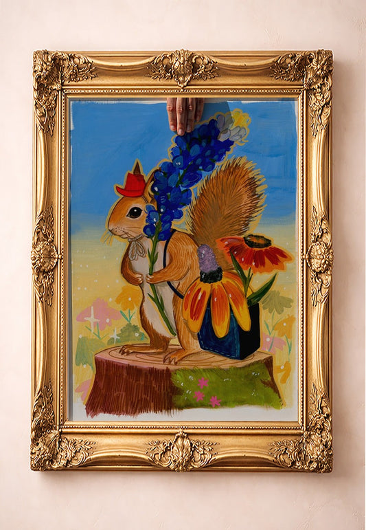 Ms. Squirrel in the Bluebonnets — art print by Caya Crum in a gold frame