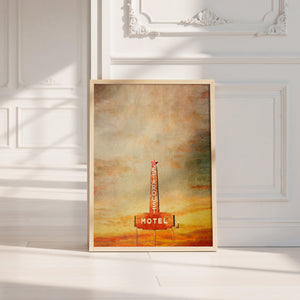 Marfa Stardust sign print by Betsy Crum in a neutral frame on a white wall