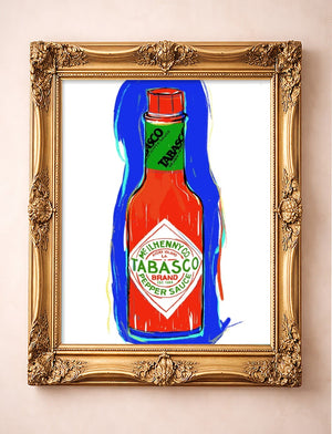 Tabasco bottle pop art print by Betsy Crum in a gold frame, red hot sauce bottle with bold blue brushwork, kitchen wall art