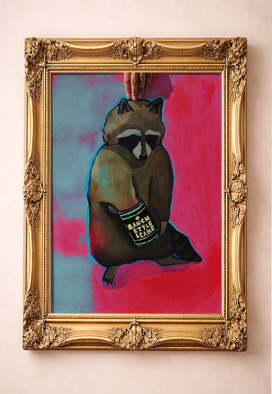 Raccoon & Ranch Style Beans — art print by Caya Crum in a gold frame