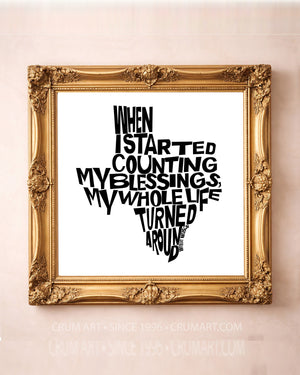 Willie Nelson Blessings B&W art print in a gold frame by Betsy Crum — square minimalist wall art from Crum Art, available at crumart.com. This museum quality print is made right here in Texas.