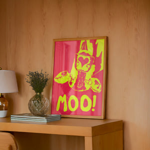The Judy's Moo Cassette (yellow and red) music wall art print by Betsy Crum — framed in a wood-accent room
