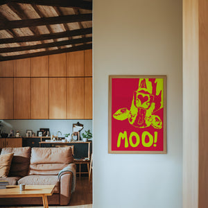 The Judy's Moo Cassette (yellow and red) music wall art print by Betsy Crum — framed in a wood-accent room